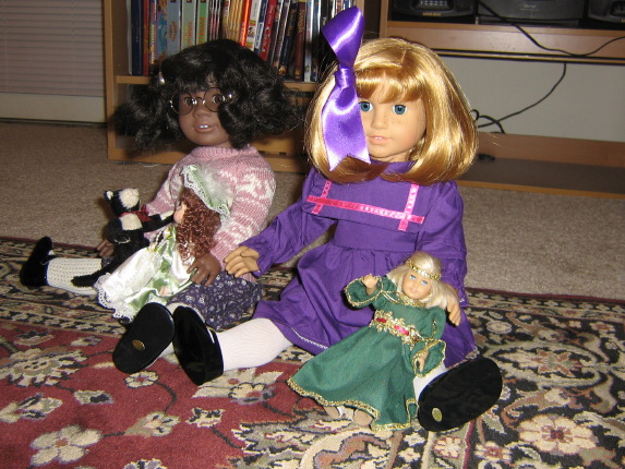 The other girls look over.